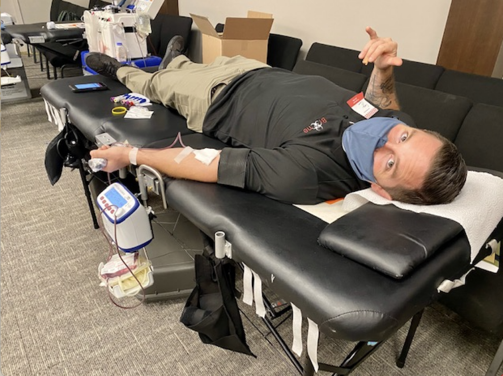 Cory Flores, Bio-One Owner, donating blood in Orange County Cory Flores, Bio-One Owner, donating blood in Orange County